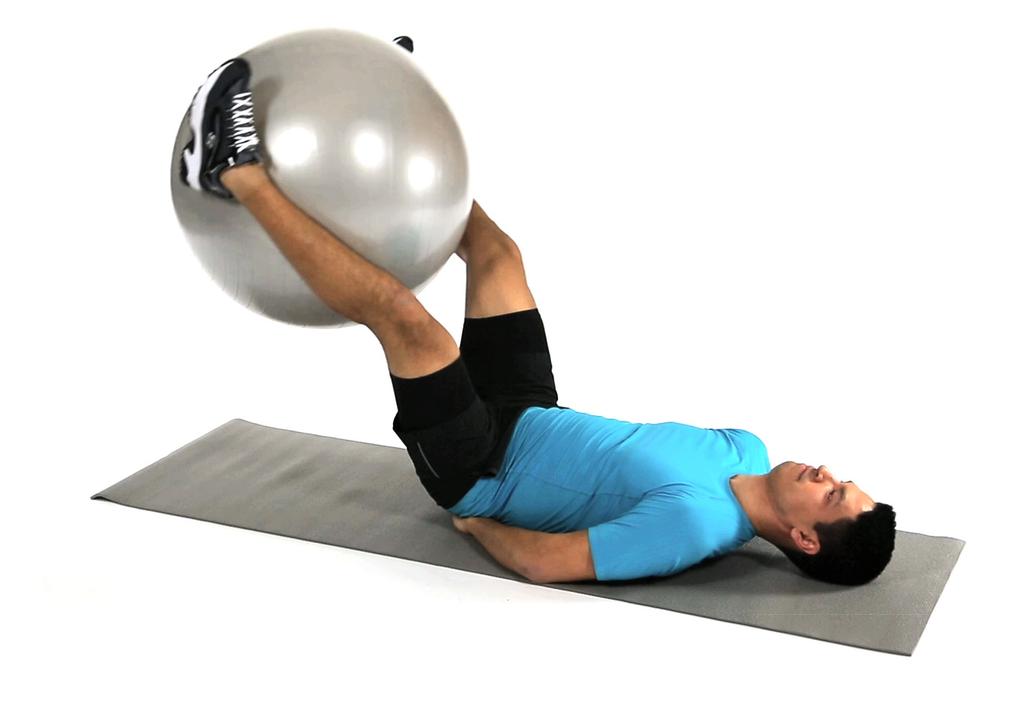 LEG RAISES WITH BALL Lie faceup on a mat with the ball between your feet. Place your hands under your glutes, palms down.