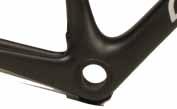 Placing polyurethane bladders inside the frames during the molding process especially at the bottom bracket and head tube areas and then applying a precise amount of pressure and