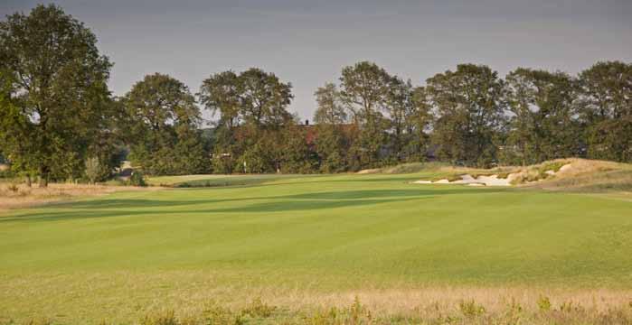 A view of Turfvaert s lengthy par-4 ninth hole, captured from the teeing ground. The large fairway bunkers guard the ideal spot for an approach to the green.