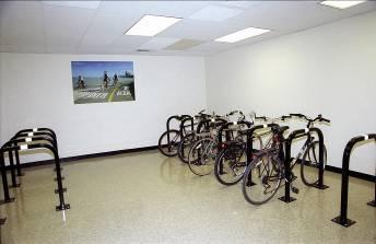 Expand efforts to encourage bike parking inside large commercial