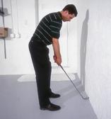 To fix a swing path that is pulled inside during the backswing, make sure the clubhead does not strike the wall. If it does, then the club went too far to the inside.