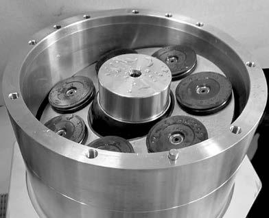 19. Place pistons in retainer plate and cylinder barrel.