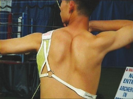 TOTAL ARCHERY when viewed from the side. When viewed from behind, the elbow should be in line with the arrow.