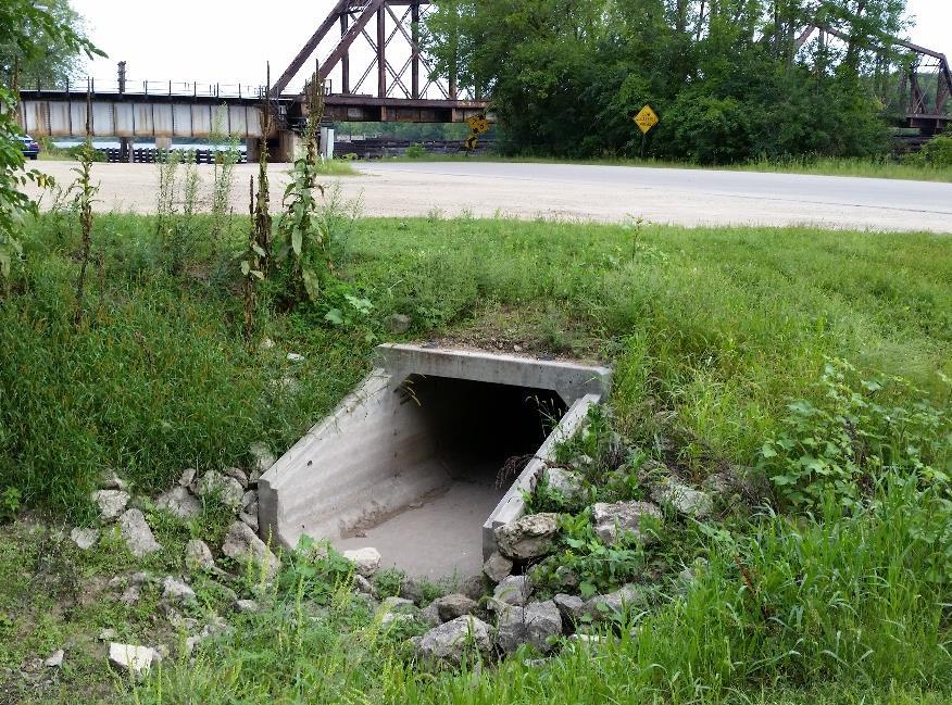 GOAL: Divert spilled product into culvert for collection in low area between roads 699a 699.