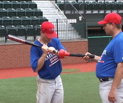Coach Assist Drills: Coach helps player with his hands on players head as the player takes these pitches, in order to assist with head discipline.