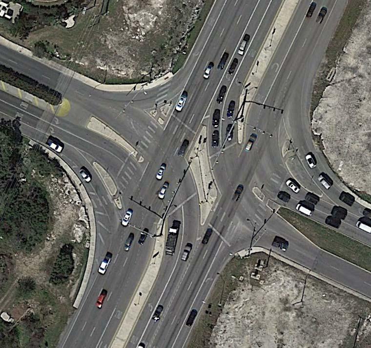 Figure 4: Example of Channelized Right Turn Lanes at an RCI in San Antonio, Texas Source: Google Earth 8 The FHWA provides the following guidance on right turn treatment
