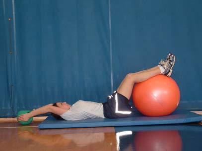 Half Fold with Ball Lie on your back and place your calves on the ball so that your knees are bent to about 110 degrees.