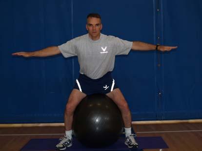 The Ball Squeeze This exercise will strengthen your inner thighs Start in a neutral seated posture with your legs straddling the ball. Hold your hands out to the side for added balance.