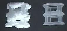 Figure 1: Crystallization fouling on the surface of a single Pall-Ring (left side) / clean Pall-Ring (right side) Figure 2: Crystallization fouling on a random packing OBJECTIVES The investigation