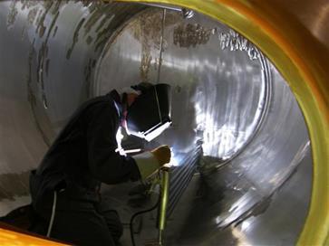 in construction activities in or near confined spaces,