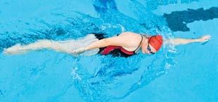 The side-lying position creates a narrow body shape, reducing form drag and lessening the water s resistance to forward movement. In the sidestroke, one arm leads Fig.
