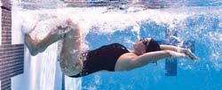 Backstroke Flip Turn 1. After you pass the backstroke flags, accelerate toward the wall (Fig. 7-17A). 2. Start the flip by turning your head and looking toward your pulling arm during the catch (Fig.