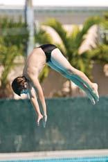 8-23B After touching your toes, extend your arms overhead. Fig. 8-23C Enter the water in a streamlined position.