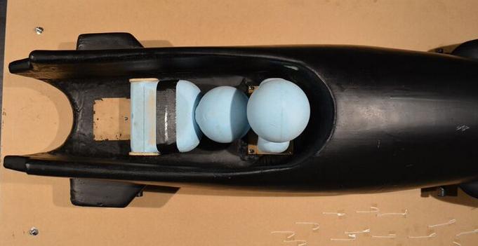 . 2.2. Aerodynamic force measurements Fig. 2. Foam models of crews fitted inside the cavity of the bobsleigh (top view).