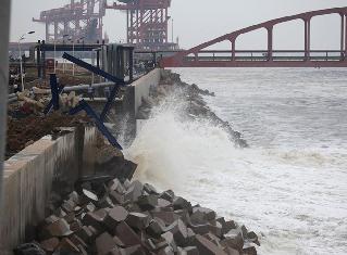 destruction of revetment in Yantai West Port Area caused by Typhoon Meari and in Dalian Fujia plant caused by Typhoon Muifa in 2011 (Fig. 7).