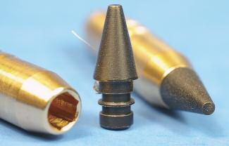 Above, 6.5mm ESP 100-grain Raptor bullets come 50 to a box; Talon tips snap into the hollow point. ous Game bullet does not wear a SealTite Band.