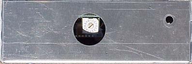 Chapter 15: Wireless On high-voltage outdoor displays (and Telelite conversions), the channel switch is located behind a hole in the side of the receiver box. (See following picture).