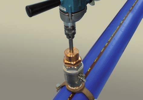the two strap bolts evenly and symmetrically. Ensure that ball valve operates correctly before fitting. 3.