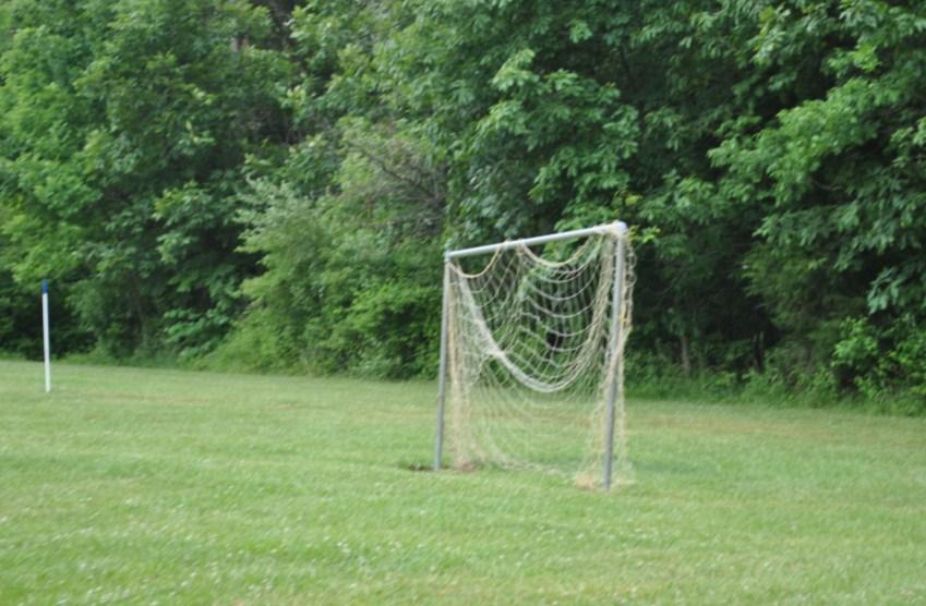 Soccer Located in the field space in front of the by