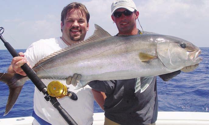 Handle Penn CEO on the water testing the new TRQ300, easily handling a quality amberjack.