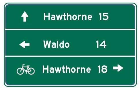 having one of the lines on a multi-line destination sign be bike-specific, or by including both a general traffic route shield, such as a U.S.