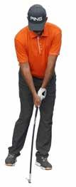 Take your normal golf stance in the center of the Orange
