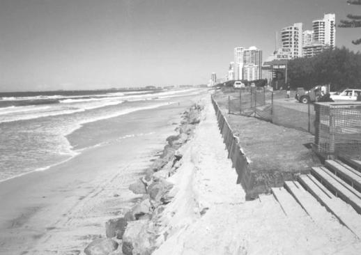 Figure 1. Photo of Narrowneck looking southward to Surfers Paradise in 1996. with no high tide beach (Figure 1), on at least a yearly basis.