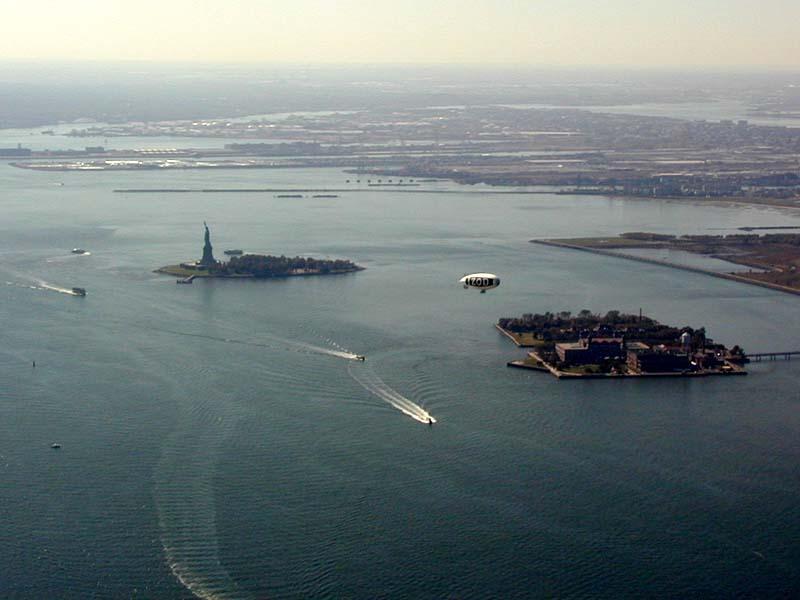 Ellis Island, to the right of center, opened a few years after the statue Was dedicated.