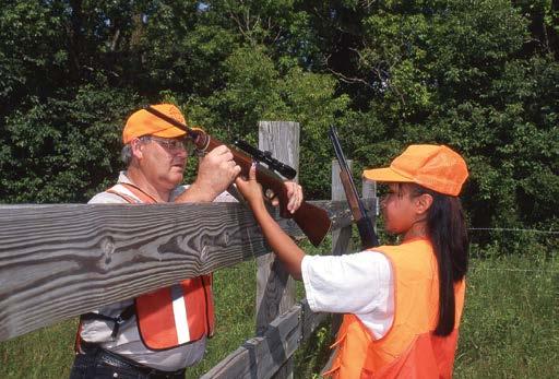 Safety Instructor Teaching hunter
