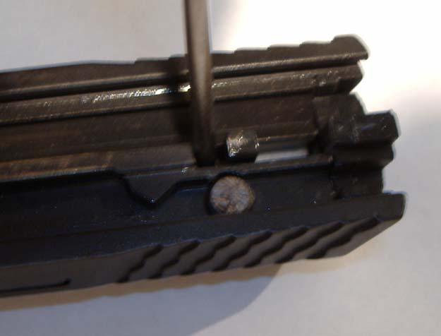 Striker modification for reduced trigger weight End cap is removed just