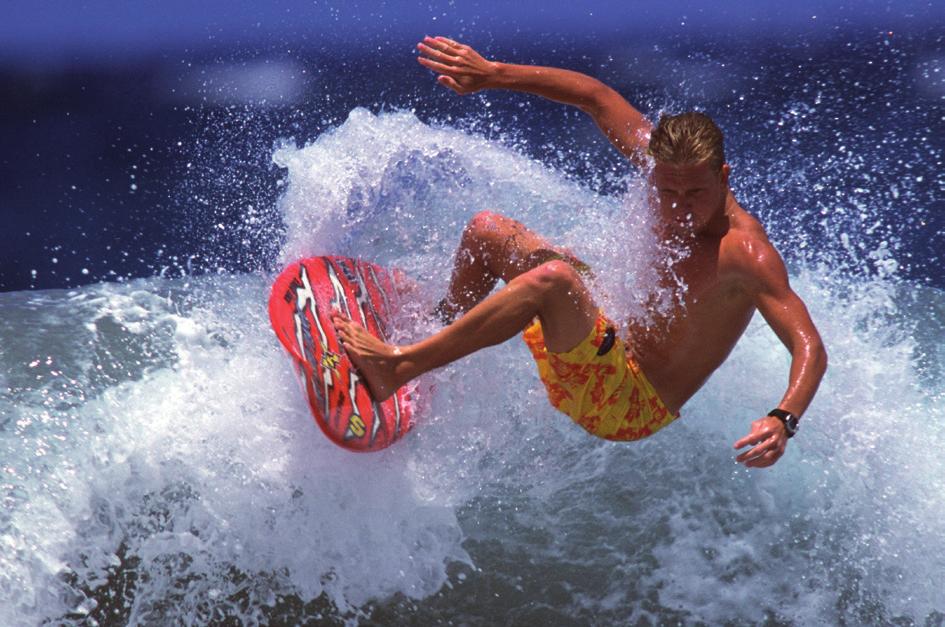 This surfer is pushed along by a breaking wave. A tsunami is a giant wave that can produce great damage. Tsunamis are not caused by the wind. Find out the three different causes of tsunamis.
