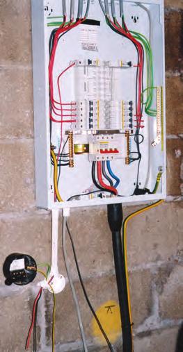 An electrician working on a new-build construction project installed the three-phase and neutral distribution board shown in the photograph.