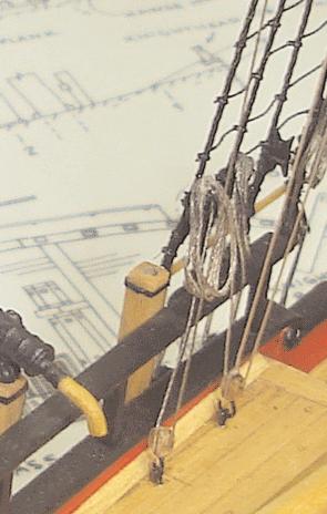 The illustration clearly shows how to rig the halliard to the center of the topsail yard. After a generous length of tan rigging line was secured to the yard as shown, I rigged them to the model.