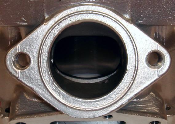 5.7 All ports may have chamfered edges to prevent ring snagging. Any additional fettling or machining is not permitted. The upper edge of the central boost port may show signs of factory machining. 5.