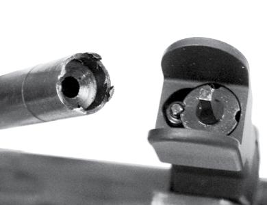 Rear Sight SIGHTS 1. The YHM rear sight can be adjusted for windage and has a dual aperture peep, one for close range and one for long range. windage knob 2.