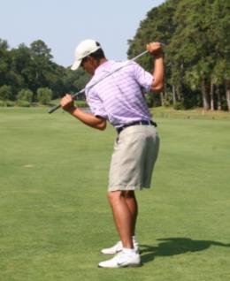 On the downswing, move your lower body by starting your left knee toward the target and then simply turn through and hold the