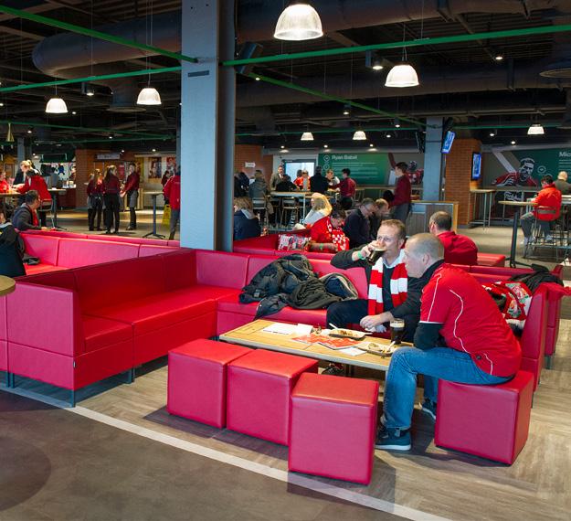 Carlsberg Dugout A bright and social sports bar concourse, The Carlsberg Dugout celebrates Liverpool FC's creativity on the pitch, whisking fans from the terraces to the side-lines for some of our