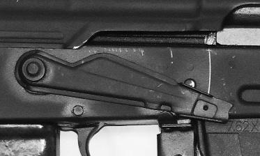 ) NOTE: When the safety lever is in its lower position on the receiver, the gun is in the FIRE position. (See Illustration #3.