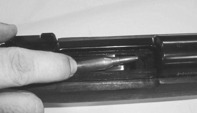 ) Note: the bolt will function with the safety in the SAFE position! 2. Lift the bolt handle upwards and pull it to the rear until it is fully open. 3. Select the proper ammunition for your rifle.