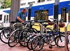 Bicycle parking can be as simple as a staple rack (see photo above) or an inverted U rack adjacent to a transit shelter.