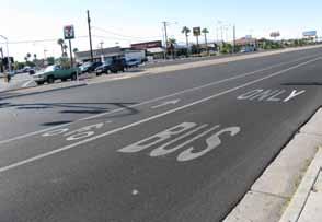 In some cases the vehicle travel lane width may be minimized in order to provide greater accommodation for bicycle or transit usage or to simply reduce vehicle travel speeds for safer pedestrian