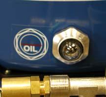 Tilt compressor and drain all oil into a container. 3. Return unit to upright position. 4.