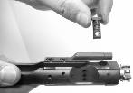 62x51mm/308 Win bolt carrier, rotate the bolt into the locked position and lift the cam pin out