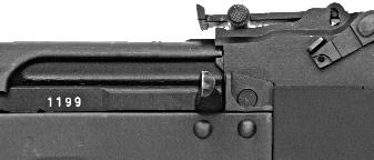) As it moves rapidly forward under spring pressure, the bolt will strip a round from the magazine and insert it into the chamber, readying the rifle for firing. 6.
