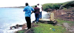 Hard engineering structures, such as this rock revetment at Victoria, Grenada, serve to protect the land, in this case, the coastal highway from erosion; but they do not promote the build-up of sand,