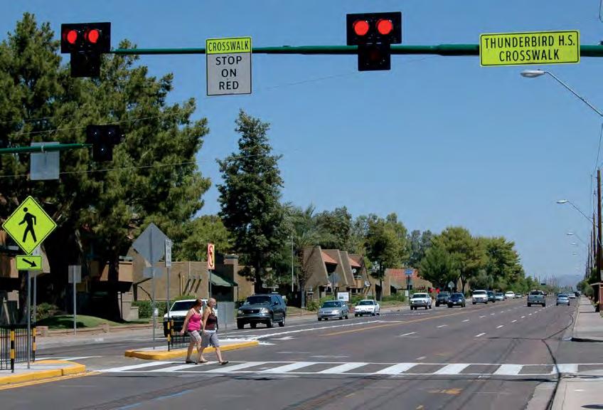A pedestrian hybrid beacon (PHB) is a traffic control device similar to a European pedestrian signal (PELICAN) that was imported to the US and adapted by engineers in Arizona to increase motorists