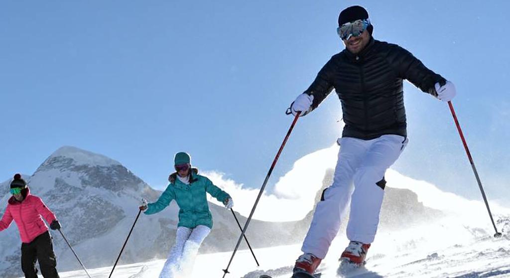 Sports & Activities** Land sports Group lessons Free access Min age (years) Dates available Alpine skiing All levels 4 years old Snowboarding All levels 8 years old