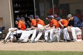 11. Players are not allowed to stand outside their dugout/bench area and make