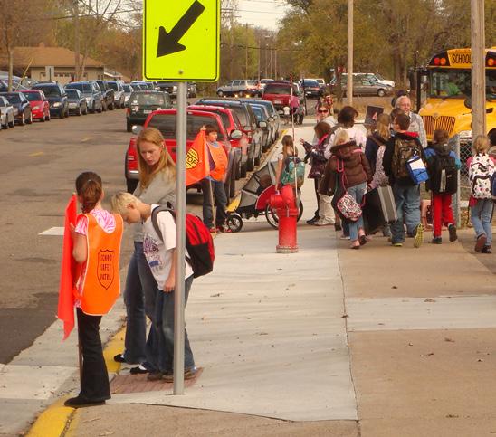 who are legally empowered to stop traffic to assist students with crossing the street. A potential Park and Walk location has been identified for the students at Edgewood Elementary School.