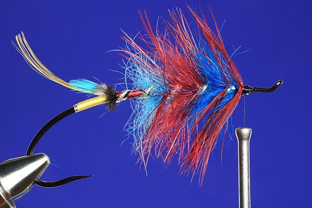 Bring the hackle forward starting at the second turn of tinsel.